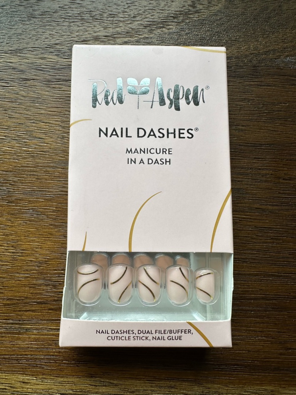 Red Aspen Nail Dashes Press-On Nails in Nude with Gold Swirl